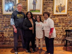 Dr. Mike Goldberg with Advisor, Brentney Simon, and her family